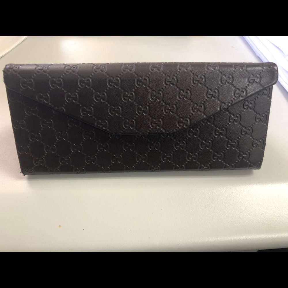 Gucci eye glass case with clean cloth